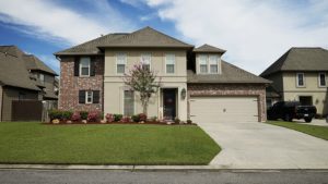 exterior of home with entry door and new windows